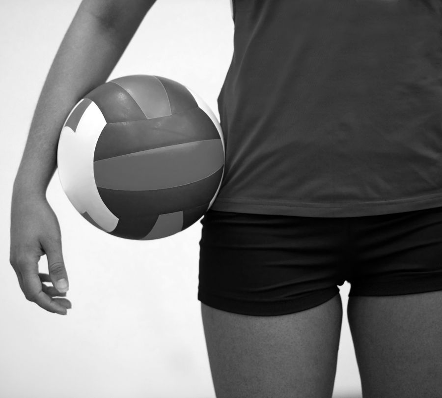 Athlete holding a volleyball